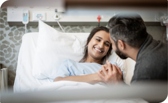 Patient in hospital bed with family 1