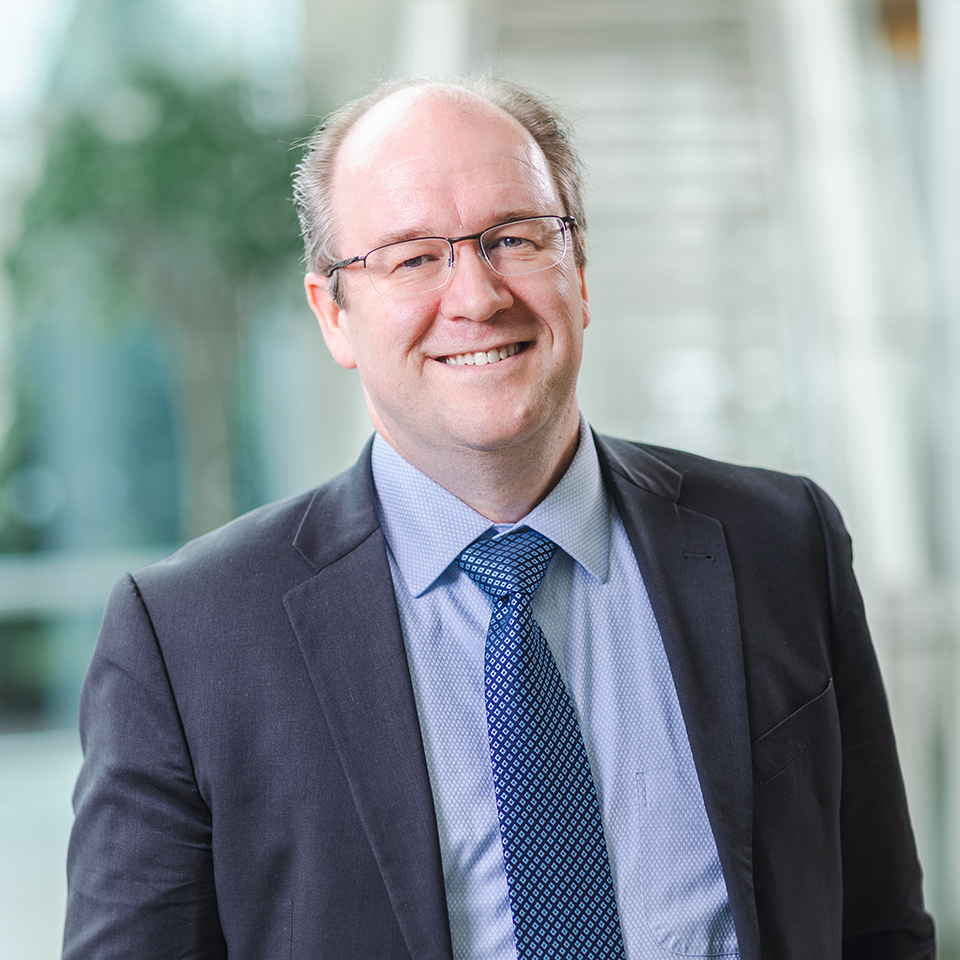 Malcolm Mac Conmara, MB BCh FACS